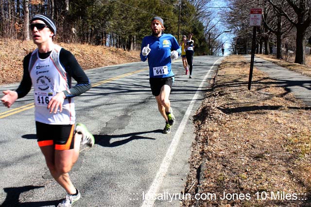 Brian Nelson (2nd in blue) bringing it home down the final hill. Photo Credit locallyrun.com
